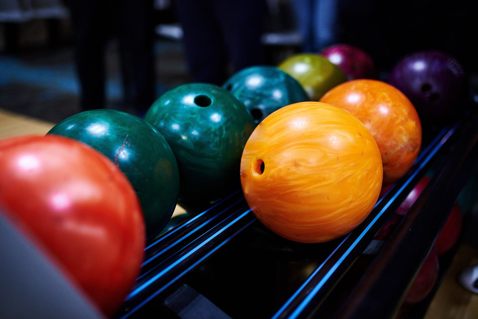 Stand with colorful bowling balls